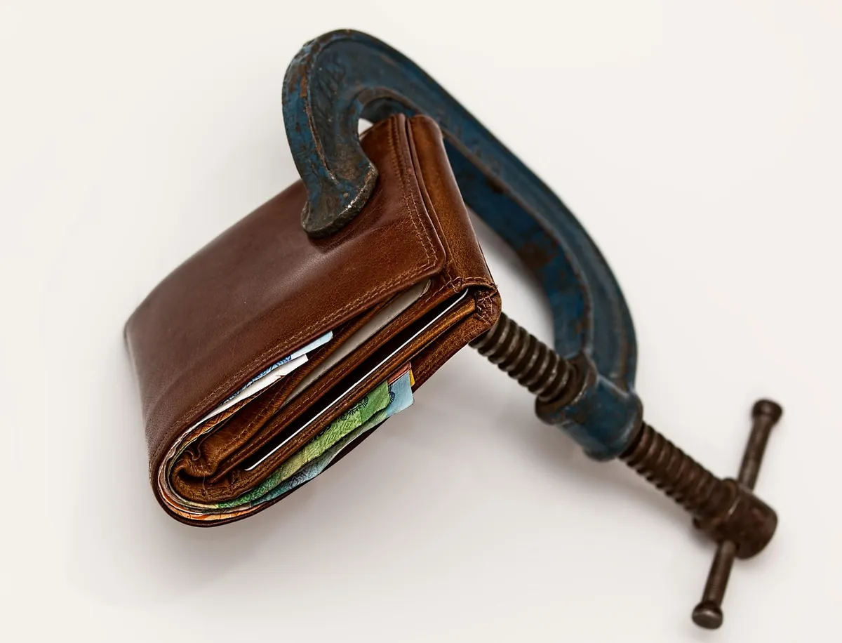 credit squeeze, taxation, purse, tax, economic stress, tight budget, consumerism, currency, inflation, financial difficulty, finance, cash, debt, bankruptcy, ec