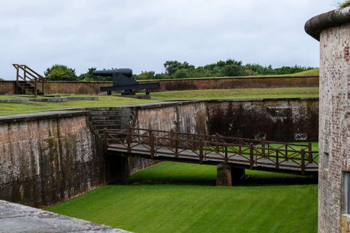 stone bridge over river in 1777 colonial town