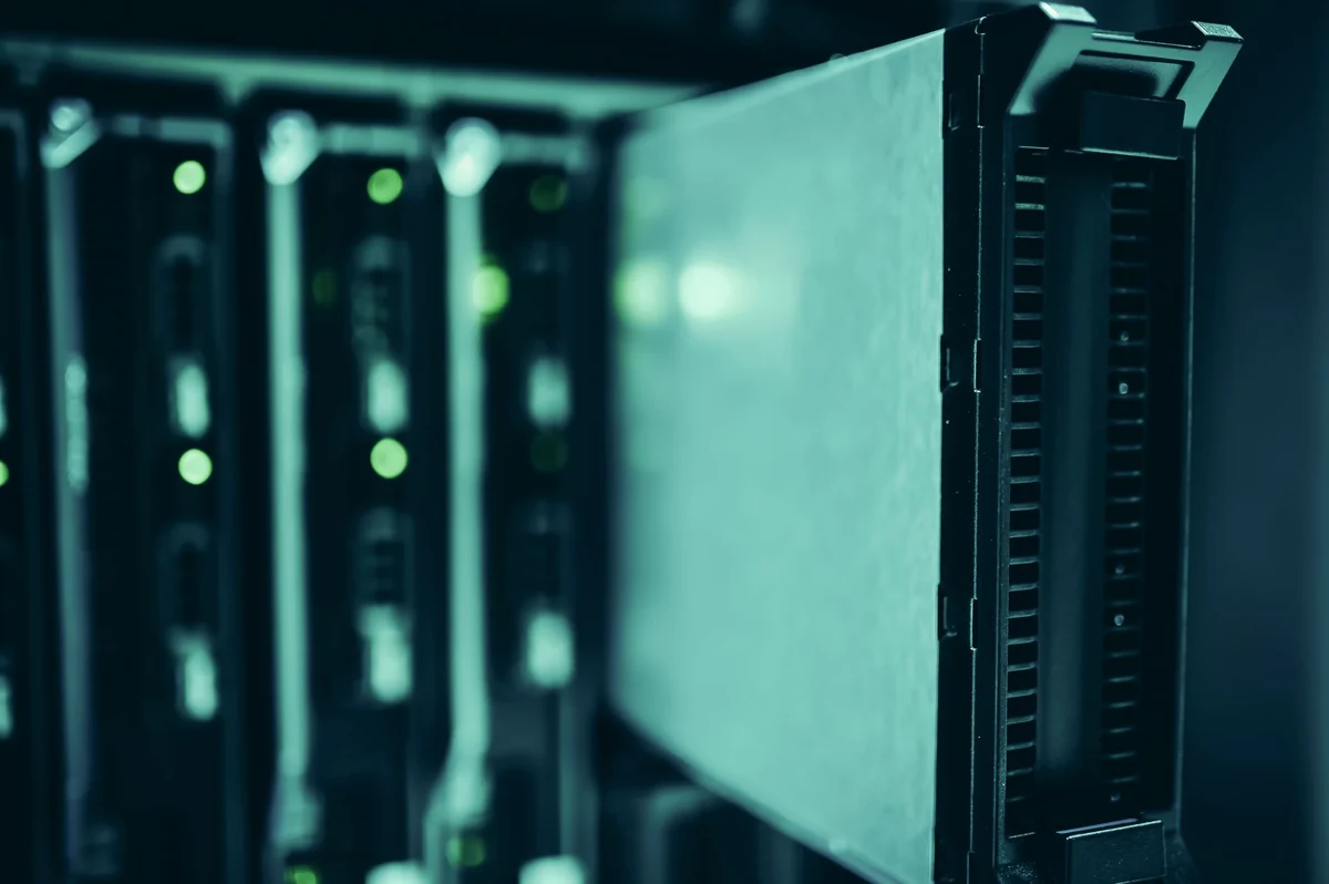 Server rack in small data center with labeled components and cabling